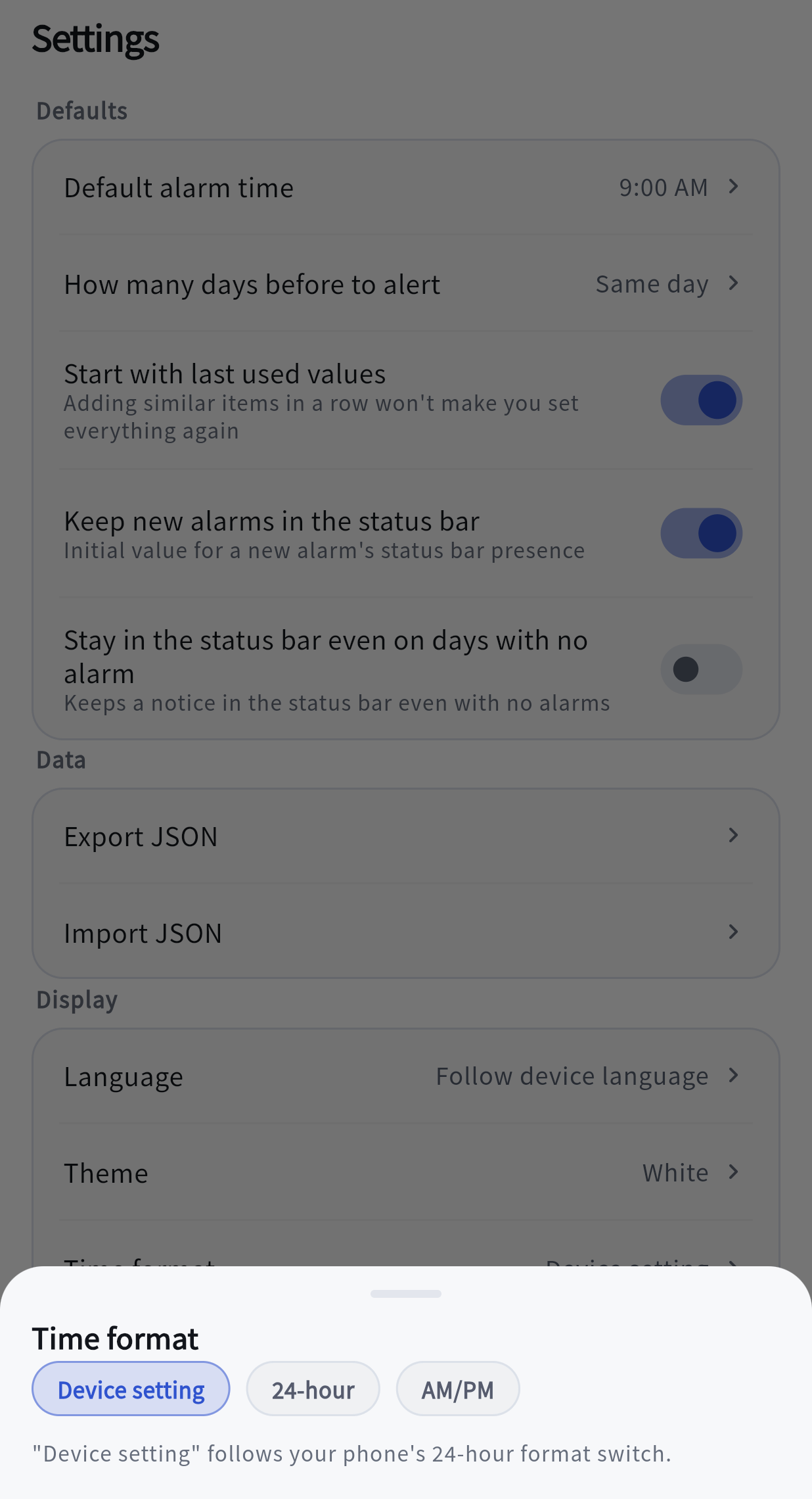 The Time format sheet open over the Settings screen: three choices, Device setting, 24-hour and AM/PM, with Device setting selected.